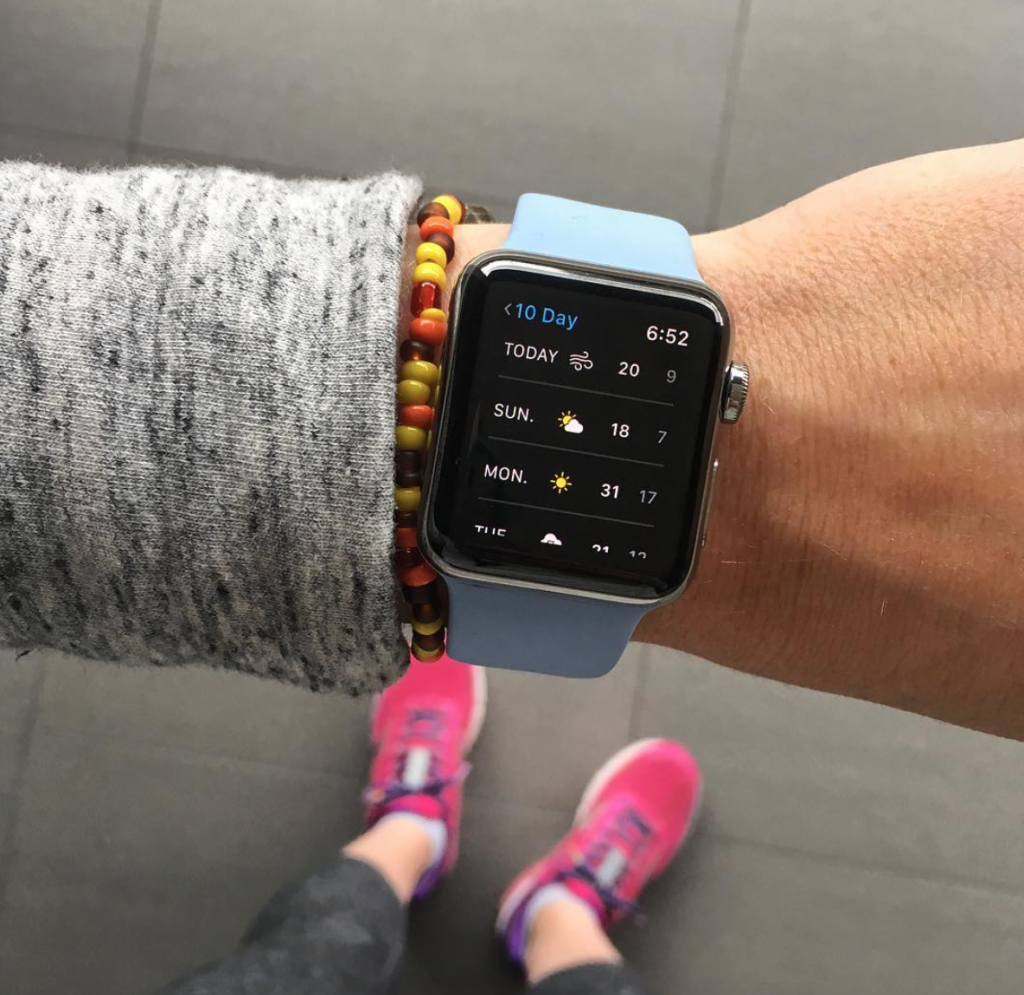 Apple Watch Series 2 with light blue sport band